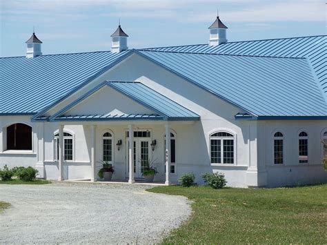 blue house with metal roof|houses with blue shingle roofs.